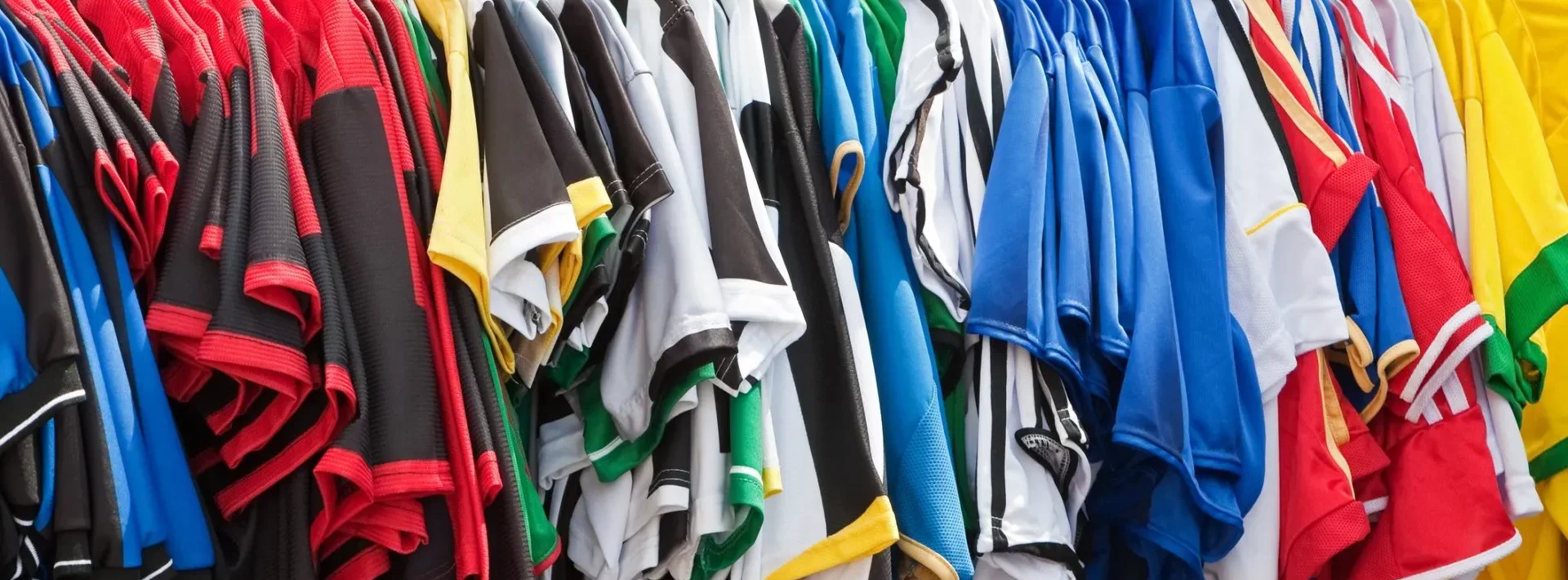 Various Uniforms hanging on the rack